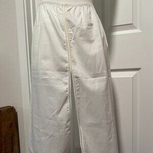 Vintage, Cotton Slip. Brand is Movie star. Small.